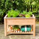 Verhoogde moestuinbak met schap - afbeelding 1